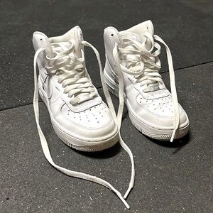 Slightly worn, white High top Nike Air Force 1 sneakers. Women’s size 6